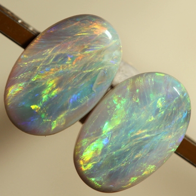 SOLID SEMI BLACK OPALS Matching pair. Bright, strong fire. SEE VIDEO
